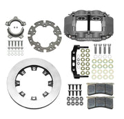 Wilwood Superlite 4 Radial rear brake kit, sprint racing, 12.19-inch plain rotors: Parts layout with one gray anodized Superlite caliper, one vented rotor ring, splined axle clamp/adapter parts, radial bracket, pads and fasteners.