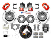 Wilwood Dynalite rear brake kit, Big Ford new-style 2.50-inch offset, 12.19-inch SRP rotors: Parts layout with two red service calipers, two motor-driven parking calipers, drilled & slotted rotor assemblies, mounting plates, pads, coiled harness, controller and fasteners.