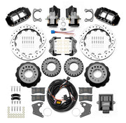 Wilwood Superlite 4R rear brake kit, Big Ford new-style 2.50-inch offset, 12.88-inch SRP rotors: Parts layout with two black service calipers, two motor-driven parking calipers, drilled & slotted rotor assemblies, mounting plates, pads, coiled harness, controller and fasteners.