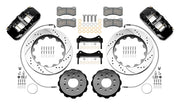 Wilwood AERO6-DS front brake kit, Wrangler JL / Gladiator, 14-inch SRP rotors: Parts layout with two black AERO6-DS calipers, drilled & slotted rotor rings, separate black hats, pads, brackets and fasteners, with curved flexlines visible.