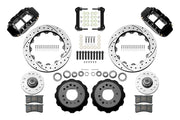Wilwood Superlite 6R front brake kit, GM AFX ProSpindles, 12.88-inch SRP rotors: Parts layout with two black Superlite 6R calipers, drilled & slotted rotors, separate hubs, black rotor hats, pads, bearings and mounting hardware.