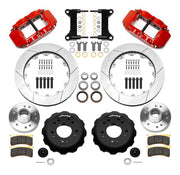 Wilwood Superlite 6R front brake kit, five-lug GM truck/SUV iron ProSpindles, 13.06-inch GT rotors: Parts layout with two red Superlite 6R calipers, gt slotted rotors, separate hubs, black rotor hats, pads, bearings and mounting hardware.