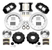 Wilwood Superlite 6R front brake kit, five-lug GM truck/SUV iron ProSpindles, 13.06-inch GT rotors: Parts layout with two black Superlite 6R calipers, gt slotted rotors, separate hubs, black rotor hats, pads, bearings and mounting hardware.