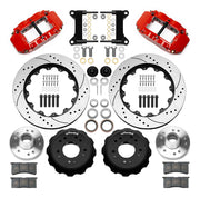 Wilwood Superlite 6R front brake kit, five-lug GM truck/SUV iron ProSpindles, 14-inch SRP rotors: Parts layout with two red Superlite 6R calipers, drilled & slotted rotors, separate hubs, black rotor hats, pads, bearings and mounting hardware.