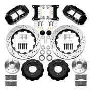 Wilwood Superlite 6R front brake kit, five-lug GM truck/SUV iron ProSpindles, 14-inch SRP rotors: Parts layout with two black Superlite 6R calipers, drilled & slotted rotors, separate hubs, black rotor hats, pads, bearings and mounting hardware.