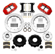 Wilwood Superlite 6R front brake kit, six-lug GM truck/SUV iron ProSpindles, 13.06-inch GT rotors: Parts layout with two red Superlite 6R calipers, gt slotted rotors, separate hubs, black rotor hats, pads, bearings and mounting hardware.