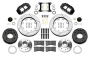 Wilwood Superlite 6R front brake kit, later GM truck/van/SUV iron ProSpindles, 12.19-inch GT rotors: Parts layout with two black Superlite 6R calipers, gt slotted rotors, separate hubs, black rotor hats, pads, bearings and mounting hardware.