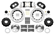 Wilwood Superlite 6R front brake kit, later GM truck/van/SUV iron ProSpindles, 14-inch SRP rotors: Parts layout with two black Superlite 6R calipers, drilled & slotted rotors, separate hubs, black rotor hats, pads, bearings and mounting hardware.