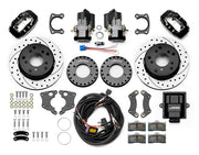 Wilwood Big Ford Bronco 2.00-inch-offset axle rear kit laid out with black Dynalite service calipers, separate electric parking calipers, 12.19-inch drilled-and-slotted rotors, brackets, pads, wiring harness and controller