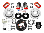 Wilwood Big Ford 2.36-inch-offset axle rear kit laid out with red Dynapro Low Profile service calipers, separate electric parking calipers, 11.00-inch plain-face rotors, brackets, pads, wiring harness and controller