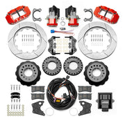 Wilwood Big Ford 2.36-inch-offset axle rear kit laid out with red Superlite 4R service calipers, separate electric parking calipers, 14.00-inch GT-slotted rotors, brackets, pads, wiring harness and controller