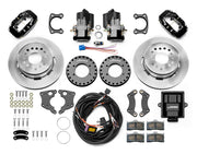 Wilwood Small Ford 2.50-inch-offset axle rear kit laid out with black Dynalite service calipers, separate electric parking calipers, 12.19-inch plain-face rotors, brackets, pads, wiring harness and controller