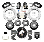 Wilwood Small Ford 2.50-inch-offset axle rear kit laid out with black Superlite 4R service calipers, separate electric parking calipers, 14.00-inch GT-slotted rotors, brackets, pads, wiring harness and controller