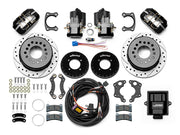 Wilwood Small Ford 2.66-inch-offset axle rear kit laid out with black Dynapro Low Profile service calipers, separate electric parking calipers, 11.00-inch drilled-and-slotted rotors, brackets, pads, wiring harness and controller