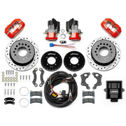 Wilwood 12 Bolt 2.75-inch-offset axle rear kit laid out with red Dynapro Low Profile service calipers, separate electric parking calipers, 11.00-inch drilled-and-slotted rotors, brackets, pads, wiring harness and controller