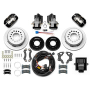 Wilwood 12 Bolt 2.75-inch-offset axle rear kit laid out with black Dynapro Low Profile service calipers, separate electric parking calipers, 11.00-inch plain-face rotors, brackets, pads, wiring harness and controller
