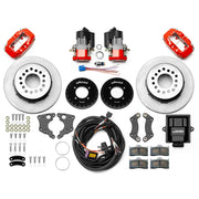 Wilwood 12 Bolt 2.75-inch-offset axle rear kit laid out with red Dynalite service calipers, separate electric parking calipers, 12.19-inch plain-face rotors, brackets, pads, wiring harness and controller