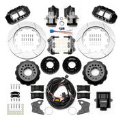 Wilwood 12 Bolt 2.75-inch-offset axle rear kit laid out with black Superlite 4R service calipers, separate electric parking calipers, 14.00-inch GT-slotted rotors, brackets, pads, wiring harness and controller
