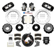 Wilwood 12 Bolt 2.75-inch-offset axle rear kit laid out with black AERO4 service calipers, separate electric parking calipers, 14.00-inch GT-slotted rotors, brackets, pads, wiring harness and controller