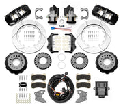 Wilwood Big Ford 2.36-inch-offset axle rear kit laid out with black AERO4 service calipers, separate electric parking calipers, 14.00-inch GT-slotted rotors, brackets, pads, wiring harness and controller