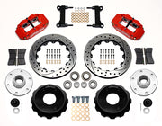 Wilwood red front brake kit for Chevrolet/GMC six-lug 13.06-inch Superlite drop-spindle applications, laid out with two-piece drilled and slotted 13.06-inch rotors, hubs, bearings, pads, brackets and fasteners
