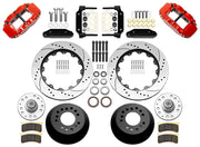 Wilwood red front brake kit for Ford/Mercury factory disc-spindle applications, laid out with two-piece drilled and slotted 14.00-inch rotors, hubs, bearings, pads, brackets and fasteners