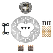 Wilwood left-front sprint with titanium rotor kit laid out with a gray caliper, slotted titanium rotor, pads, bracket and hardware