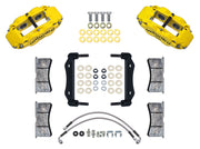 Wilwood yellow Superlite front caliper kit for 1969–1983 Porsche 911 caliper applications, laid out with brackets, pads, braided hoses and mounting hardware