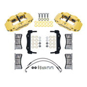 Wilwood yellow Superlite front caliper kit for 1984–1989 Porsche 911 caliper applications, laid out with brackets, pads, braided hoses and mounting hardware