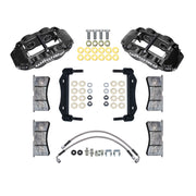 Wilwood black Superlite front caliper kit for 1984–1989 Porsche 911 caliper applications, laid out with brackets, pads, braided hoses and mounting hardware