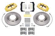 Wilwood front FNSL4R brake kit for Porsche 911 Carrera 24 mm configuration: Two yellow FNSL4R calipers, plain-faced rotors with integral centers, mounting brackets, braided hoses, pads and fasteners arranged in pairs.