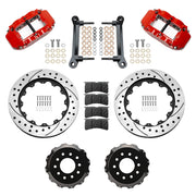 Wilwood front FNSL6R brake kit for DSE C10 13.06-inch conversion: Parts layout with two red-finish FNSL6R calipers, drilled and slotted rotor rings, separate black hats, pads, brackets and fasteners.