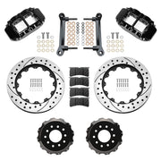 Wilwood front FNSL6R brake kit for DSE C10 13.06-inch conversion: Parts layout with two black FNSL6R calipers, drilled and slotted rotor rings, separate black hats, pads, brackets and fasteners.