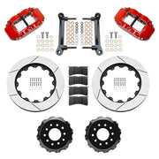 Wilwood front FNSL6R brake kit for DSE C10 13.06-inch conversion: Parts layout with two red-finish FNSL6R calipers, slotted rotor rings, separate black hats, pads, brackets and fasteners.