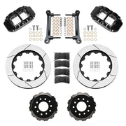 Wilwood front FNSL6R brake kit for DSE C10 13.06-inch conversion: Parts layout with two black FNSL6R calipers, slotted rotor rings, separate black hats, pads, brackets and fasteners.