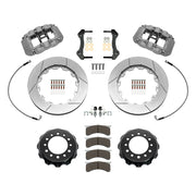 Wilwood front AV6R brake kit for Toyota Hilux: Parts layout with two gray anodized AV6R calipers, slotted rotor rings, separate black hats, pads, brackets and fasteners, with braided hoses.