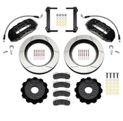 Wilwood front TX6R brake kit for Ram 1500 six-lug: Parts layout with two black TX6R calipers, slotted rotor rings, separate black hats, pads, brackets and fasteners, with braided hoses.