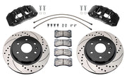 Wilwood front AERODM brake kit for early GM 1500 trucks: Two black AERODM calipers with drilled and slotted one-piece rotors, brake pads and mounting fasteners, braided hoses and fittings laid out.