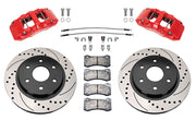 Wilwood front AERODM brake kit for Ford F-150/Expedition and Lincoln Navigator: Two red-finish AERODM calipers with drilled and slotted one-piece rotors, brake pads and mounting fasteners, braided hoses and fittings laid out.