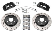 Wilwood front AERODM brake kit for Ford F-150 Raptor 2017–2020: Two black AERODM calipers with drilled and slotted one-piece rotors, brake pads and mounting fasteners, braided hoses and fittings laid out.