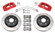 Wilwood front AERODM brake kit for Ford F-150 Raptor 2017–2020: Two red-finish AERODM calipers with slotted one-piece rotors, brake pads and mounting fasteners, braided hoses and fittings laid out.