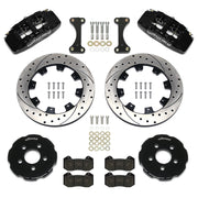 Wilwood front Dynapro 6 brake kit for PT Cruiser/Neon SRT-4: Parts layout with two black Dynapro 6 calipers, drilled and slotted rotor rings, separate black hats, pads, brackets and fasteners.