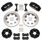 Wilwood front Dynapro 6 brake kit for PT Cruiser/Neon SRT-4: Parts layout with two black Dynapro 6 calipers, plain-faced rotor rings, separate black hats, pads, brackets and fasteners.