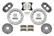 Wilwood front FNSL6R brake kit for Civic/Integra road-race package: Parts layout with two gray anodized FNSL6R calipers, slotted rotor rings, separate black hats, pads, brackets and fasteners, with braided hoses.