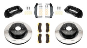 Wilwood rear TX4R brake kit for GM truck factory parking-brake arrangement: Two black TX4R calipers with slotted one-piece rotors, brake pads and mounting fasteners, with separate caliper mounting brackets.