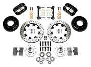 Wilwood front Dynapro brake kit for Tri-Five ProSpindle Dynapro configuration: Two black Dynapro calipers, drilled and slotted rotor rings, separate black hats, silver hubs, bearings, seals, pads, brackets and hardware laid out.