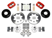 Wilwood front Dynapro brake kit for Tri-Five ProSpindle Dynapro configuration: Two red-finish Dynapro calipers, plain-faced rotor rings, separate black hats, silver hubs, bearings, seals, pads, brackets and hardware laid out.