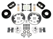 Wilwood front Dynapro brake kit for Tri-Five ProSpindle Dynapro configuration: Two black Dynapro calipers, plain-faced rotor rings, separate black hats, silver hubs, bearings, seals, pads, brackets and hardware laid out.