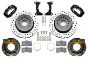 Wilwood rear Forged Dynalite Internal brake kit for BOP 12.19-inch staggered layout: Black caliper pair with drilled and slotted rotors, internal drum parking-brake assemblies, brackets, pads, registration rings and fasteners.