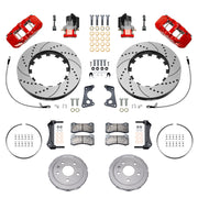 Wilwood rear AERO4 brake kit for Corvette C8 service and parking brakes: Pair of red-finish AERO4 service calipers, separate EPB calipers, drilled and slotted rotor rings, silver hats, hoses, pads, brackets and fasteners laid out.